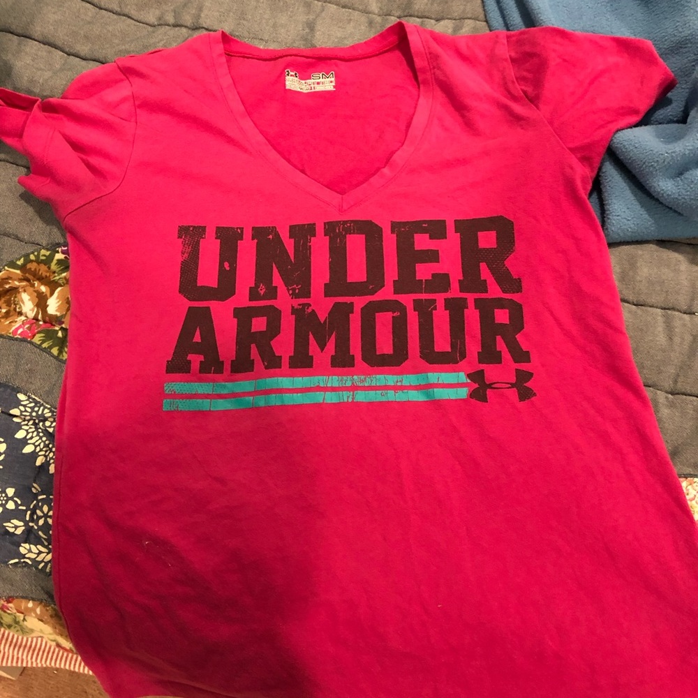 Under armour shirt with small bleach stain on back